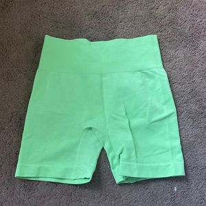 green athletic shorts